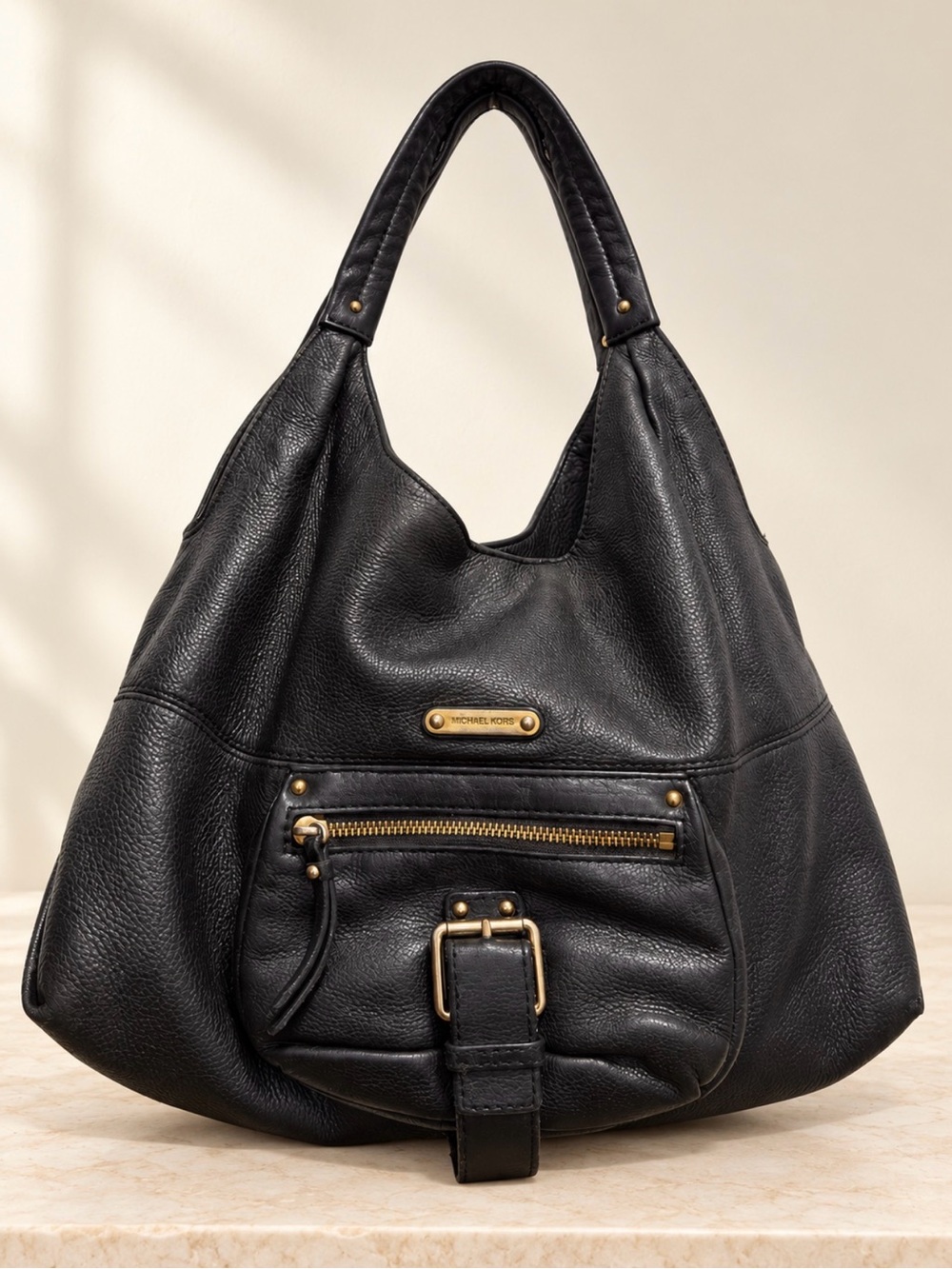 Michael Kors Black Pebbled Leather Shoulder hobo 
Bag with Gold Hardware